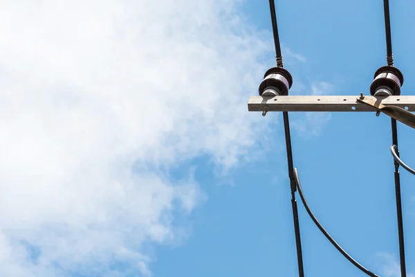 Street lamp and cable on the blue sky — Stock Photo, Image