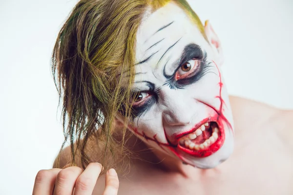 Uomo con volto Halloween arte su sfondo bianco — Foto Stock