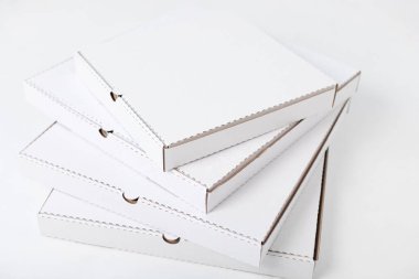 White blank pizza boxes on white background. Mock-up.