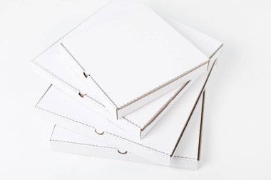 White blank pizza boxes on white background. Mock-up.