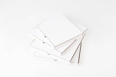 White blank pizza boxes on white background. Mock-up.