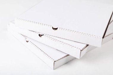 White blank pizza boxes on white background. Mock-up.