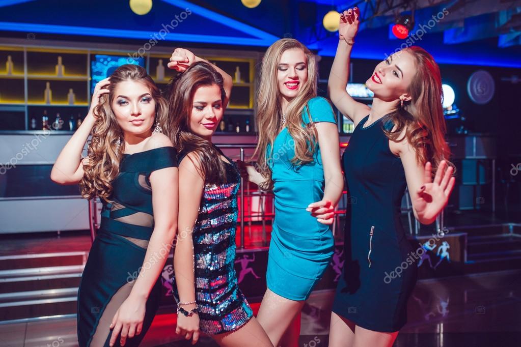 Beautiful girls having fun at a party in nightclub — Stock Photo ...