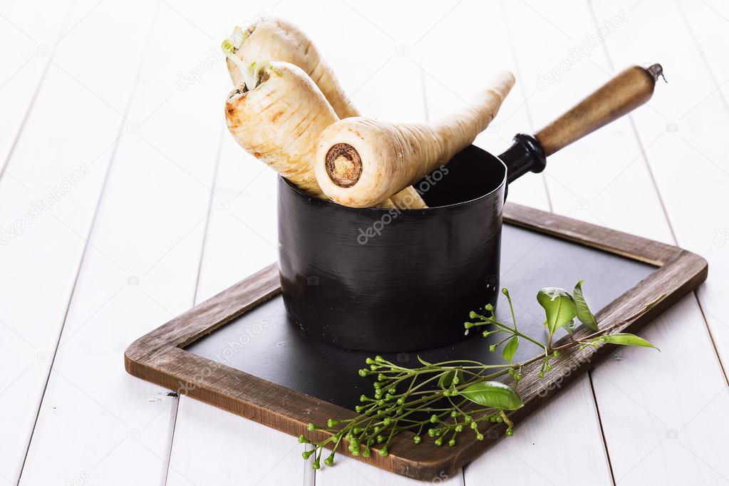 Group of parsnips in a pot