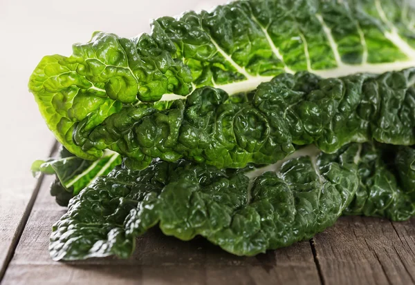 Silverbeet leaves on a rustic wooden background — Stock Photo, Image