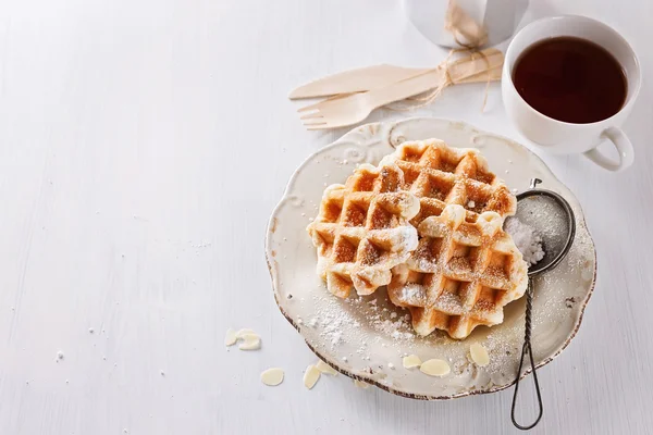Homemade waffles over white wooden background — Stock Photo, Image