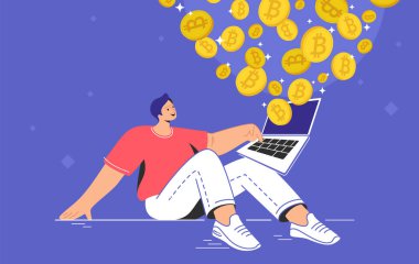 Genç adam tek başına oturuyor ve dizüstü bilgisayarında bitcoin alıp satıyor.