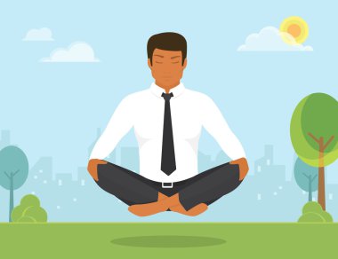 Adam lotus pozisyonda oturuyor ve yoga yaparken