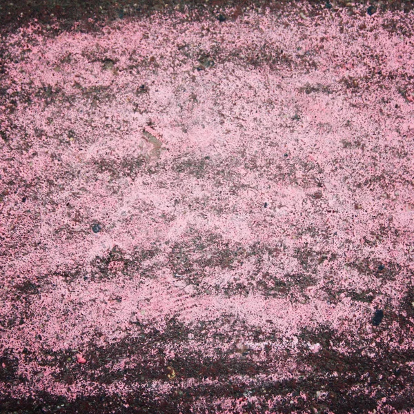 Pink chalk on the grey asphalt. Abstract backdrop. — Stock Photo, Image