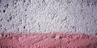 Pembe boya beton yüzeyi. Metin için çerçeve.