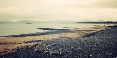 Waterville, County Kerry - vintage etkisi içinde kayalık deniz manzarası. 