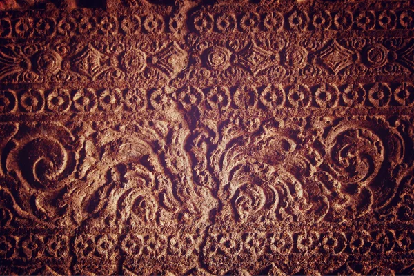 Ancient wall with engravings  - vintage effect. — Stock Photo, Image