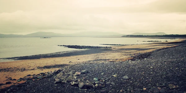 Rotsachtige zeegezicht in Waterville, County Kerry - vintage effect. — Stockfoto