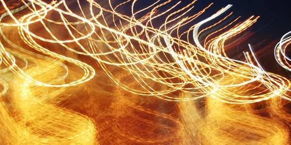 Lights in motion in dark — Stock Photo, Image