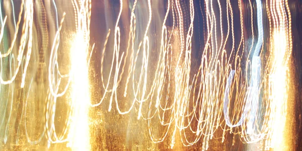 Abstract light trails in motion — Stock Photo, Image