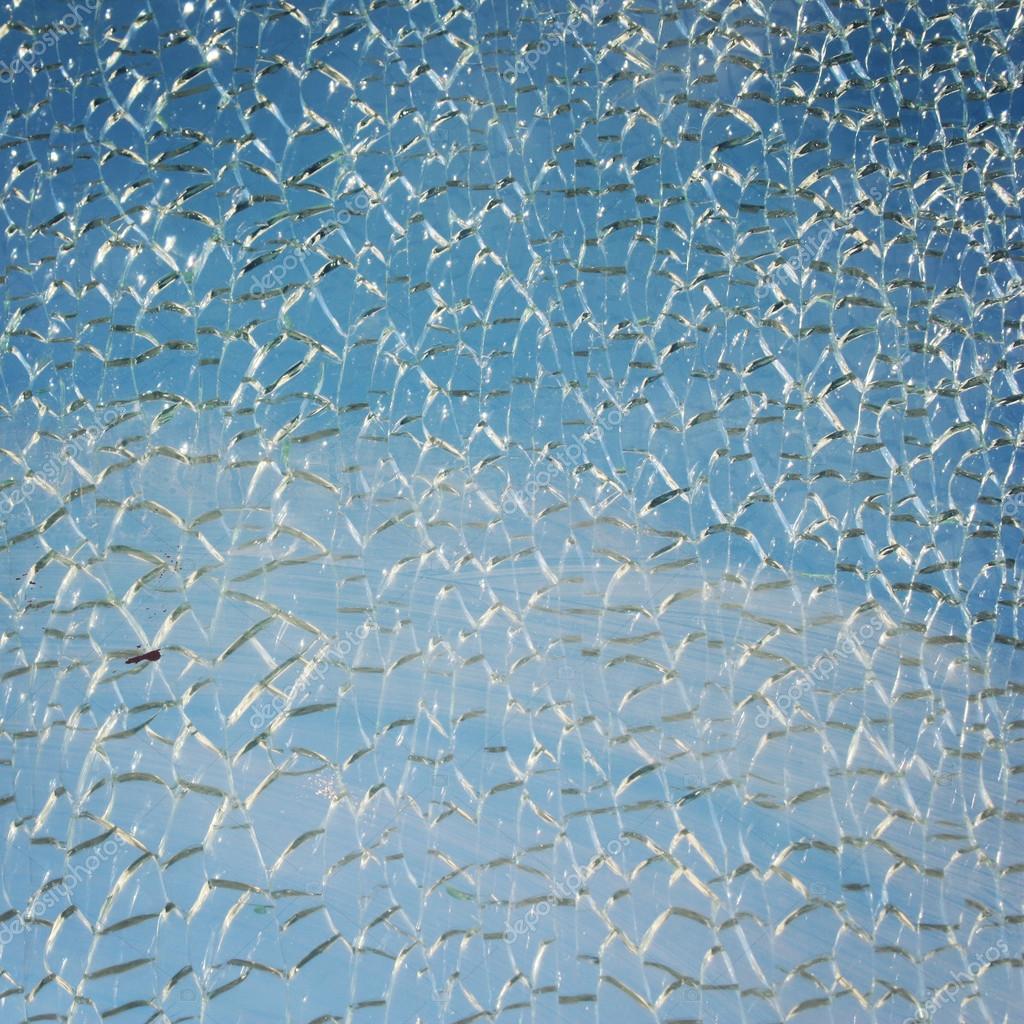 Blue sky behind broken glass surface. Aged photo. — Stock Photo © Lora