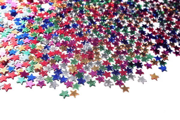 Scattered glittering stars confetti. Close up. — Stock Photo, Image