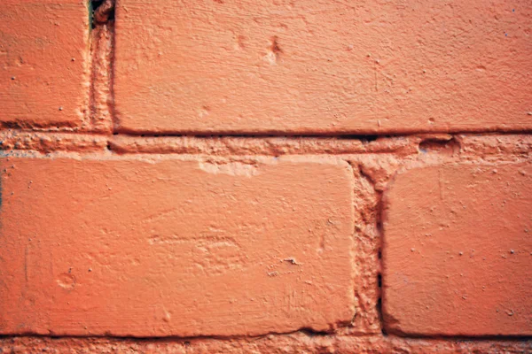 Τοίχο από τούβλα πορτοκαλί. Κινηματογράφηση σε πρώτο πλάνο. Τούβλα υφή. — Φωτογραφία Αρχείου