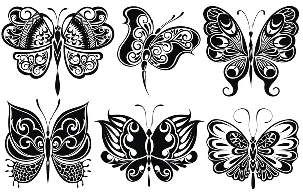 Set of butterflies silhouettes — Stock Vector