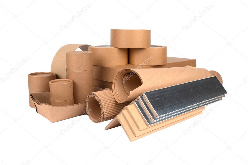 Paper packaging - cardboard edge protectors with alu paper, cardboard boxes, rolls of paper, paper tubes, packaging scotch tape, sheets of cardboard isolated. Sustainable packaging concept