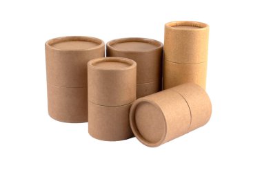 Different paper tubes with paper cap or lids, cardboard containers for packaging isolated on white background with copy space, mockup. Natural cosmetic paper packaging