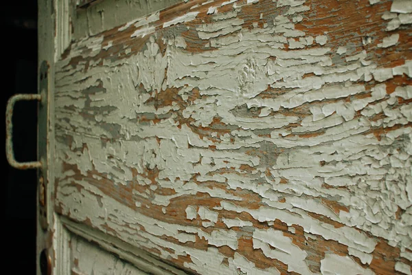 Peeling paint of an old door — Stock Photo, Image