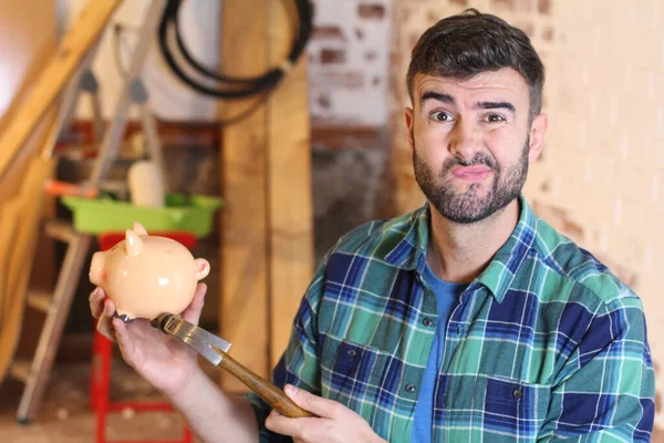 Portrait Handsome Young Repairman Holding Piggy Bank His Workshop — Stock Fotó