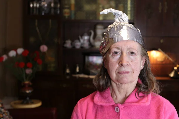 Close Portrait Mature Woman Aluminum Foil Hat Home — Stockfoto