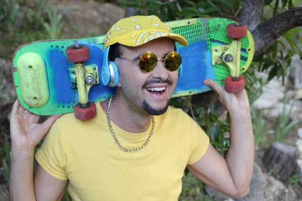 Close Portrait Handsome Young Man Colorful Skateboard Standing Park — Stock Photo, Image