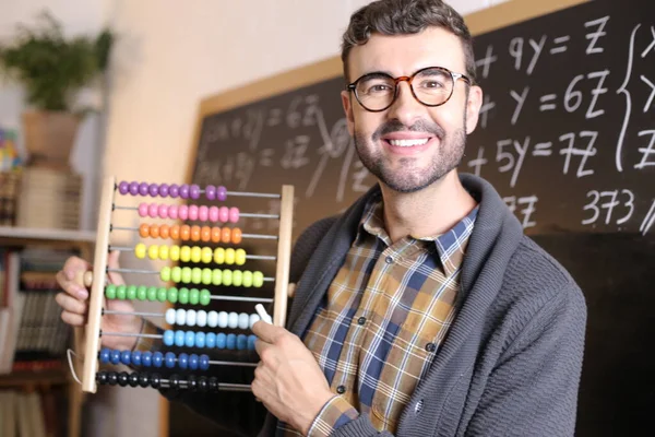 Close Portrait Handsome Young Teacher Holding Old Colorful Scores Front — Stock Photo, Image
