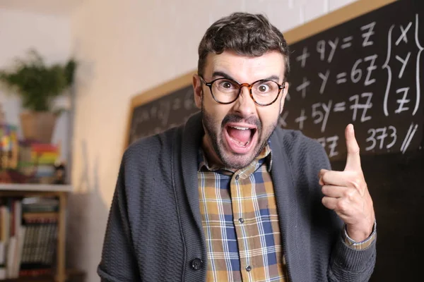 Close Portrait Angry Young Teacher Front Blackboard Classroom — Stock Photo, Image