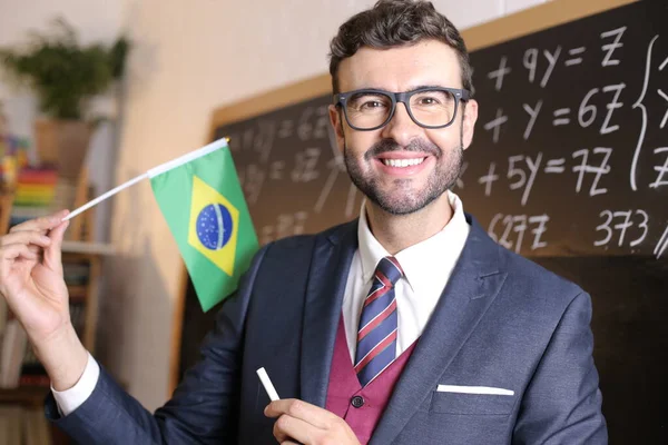 Close Retrato Belo Jovem Professor Segurando Bandeira Brasil Frente Quadro — Fotografia de Stock