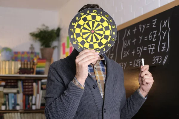 Close Portrait Handsome Young Teacher Holding Dart Aim Board Front — 图库照片