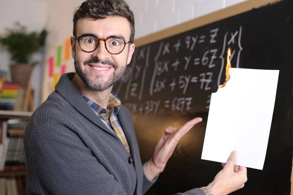 Close Portrait Handsome Young Teacher Suit Holding Burning Paper Front — Zdjęcie stockowe