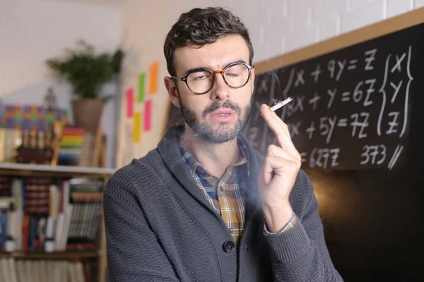Close Portrait Handsome Young Teacher Holding Chalk Smoking Cigarette Front — Foto Stock