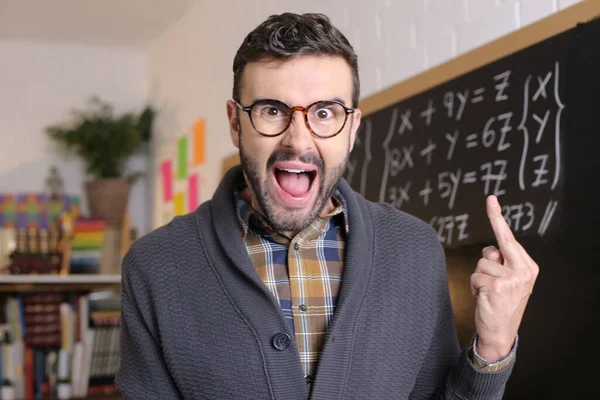 Close Portrait Handsome Young Teacher Showing Middle Finger Front Blackboard — Stock Photo, Image
