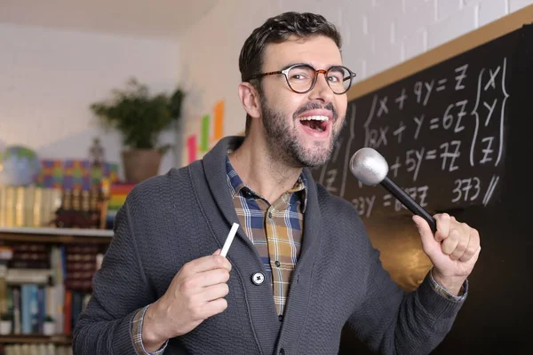 Close Portrait Handsome Young Teacher Singing Fake Microphone Front Blackboard —  Fotos de Stock