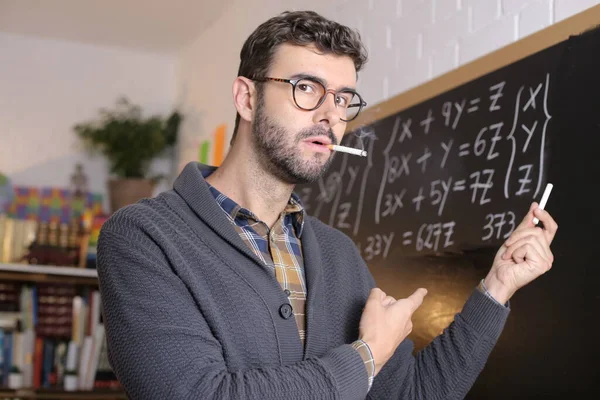 Close Portrait Handsome Young Teacher Holding Chalk Smoking Cigarette Front —  Fotos de Stock