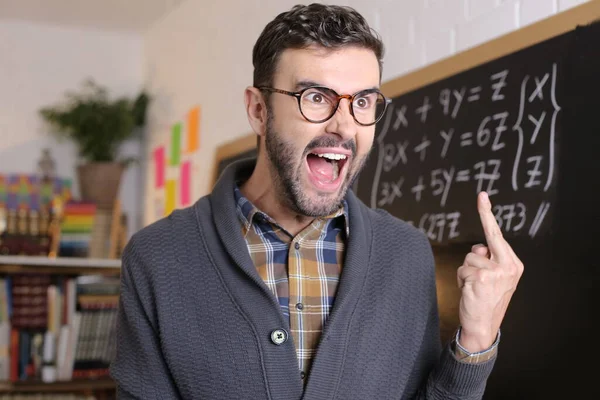 Close Portrait Handsome Young Teacher Showing Middle Finger Front Blackboard — Stock Photo, Image