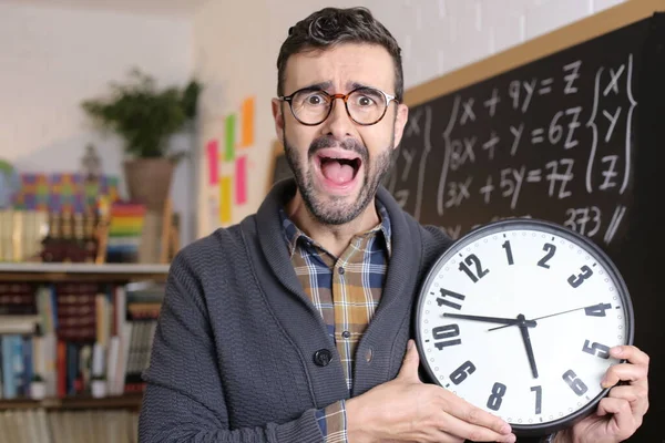Close Portrait Handsome Young Teacher Holding Large Clock Front Blackboard — Stock Photo, Image
