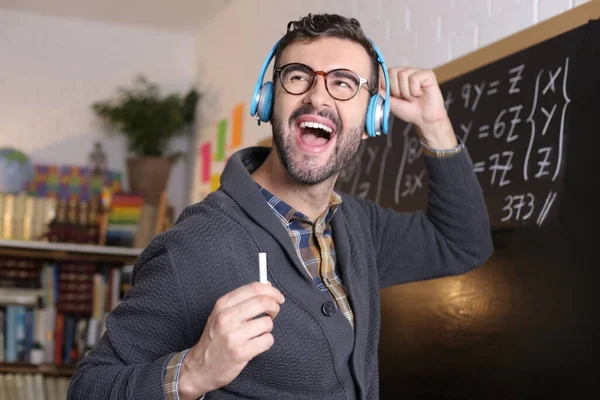 Close Portrait Handsome Young Teacher Headphones Listening Music Holding Chalk — Foto de Stock