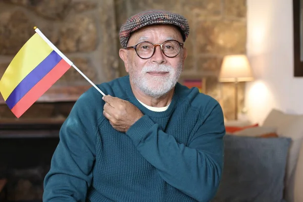 Close Portrait Handsome Senior Man Holding Colombia Flag Home — Stock Photo, Image