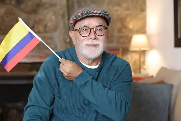 Close Portrait Handsome Senior Man Holding Colombia Flag Home — Stock Photo, Image