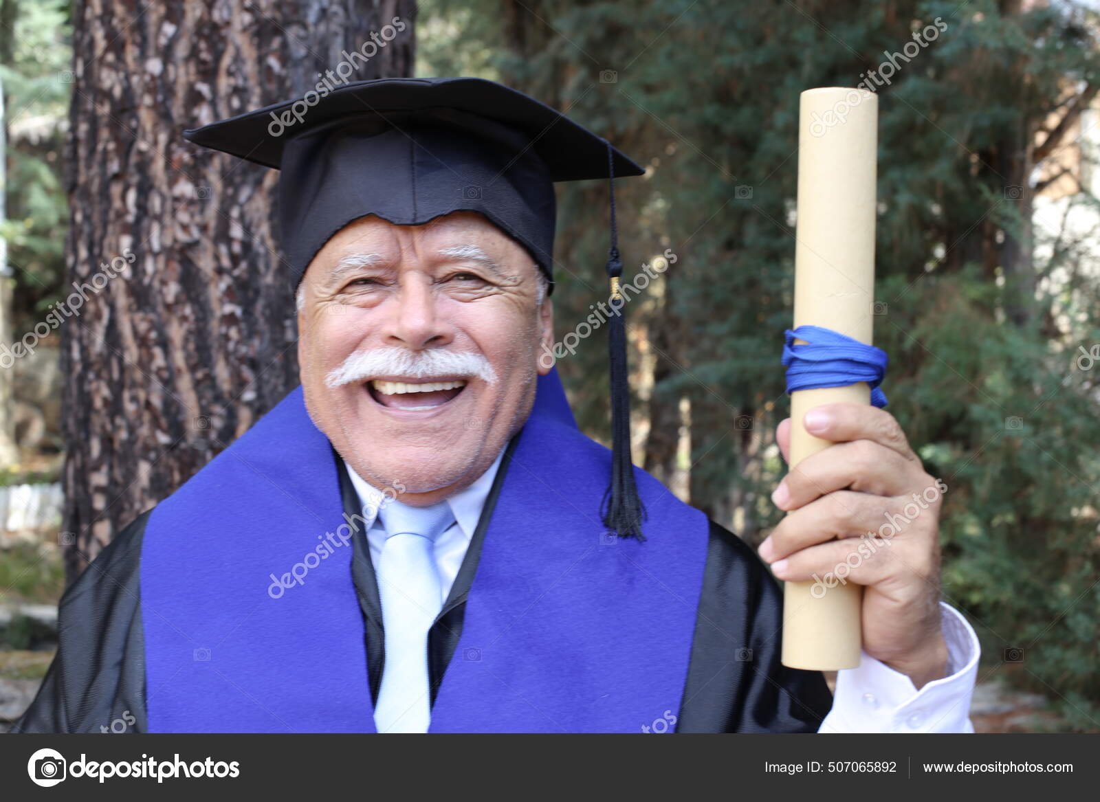 Young Isolated Graduation Suit Stock Photo by ©carballo 258331612