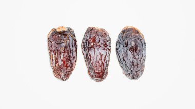 Beyaz arkaplanda üç büyük kurutulmuş tarih