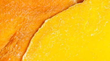 Sarı ve portakallı mango dilimleri, süper makro.