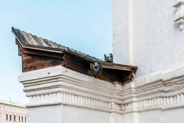 Old historic wooden roof gutter, close-up photo