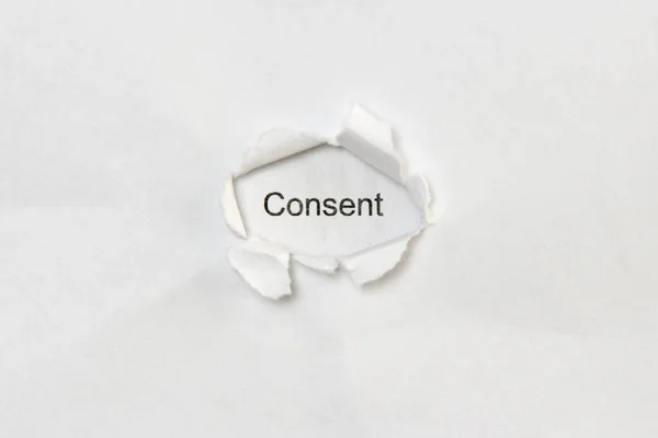 Word Consent White Isolated Background Inscription Wound Hole Paper Concept — Stock Photo, Image