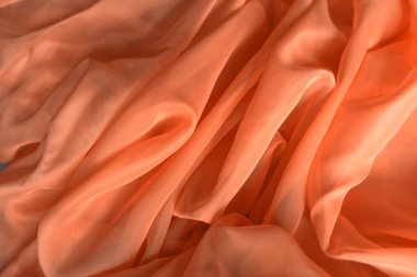 Pembe tül. Tekstil bir yumrunun içine kıvrılıp soyut bir kalıp oluşturuyor. Çok güzel, pastel renkler. Arkaplan olarak dokuyu kullan