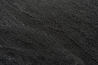 Dokuya sahip siyah beton arkaplan